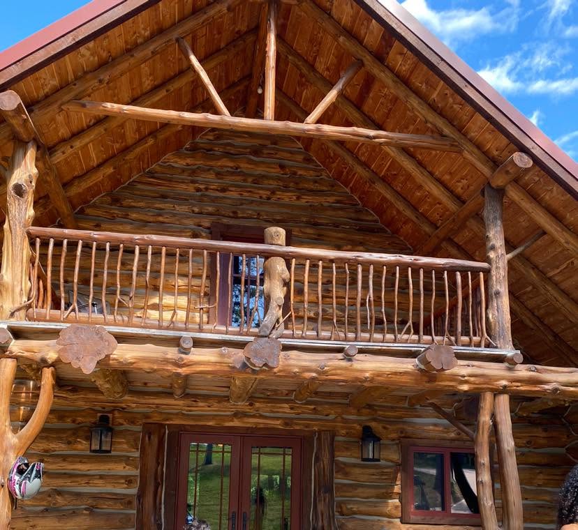 Exposed log trusses and gable, hand-peeled cedar