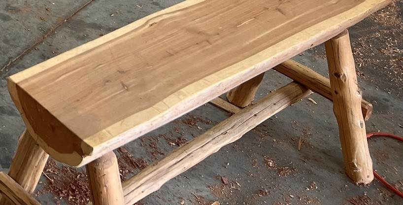 Live-edge cedar log bench