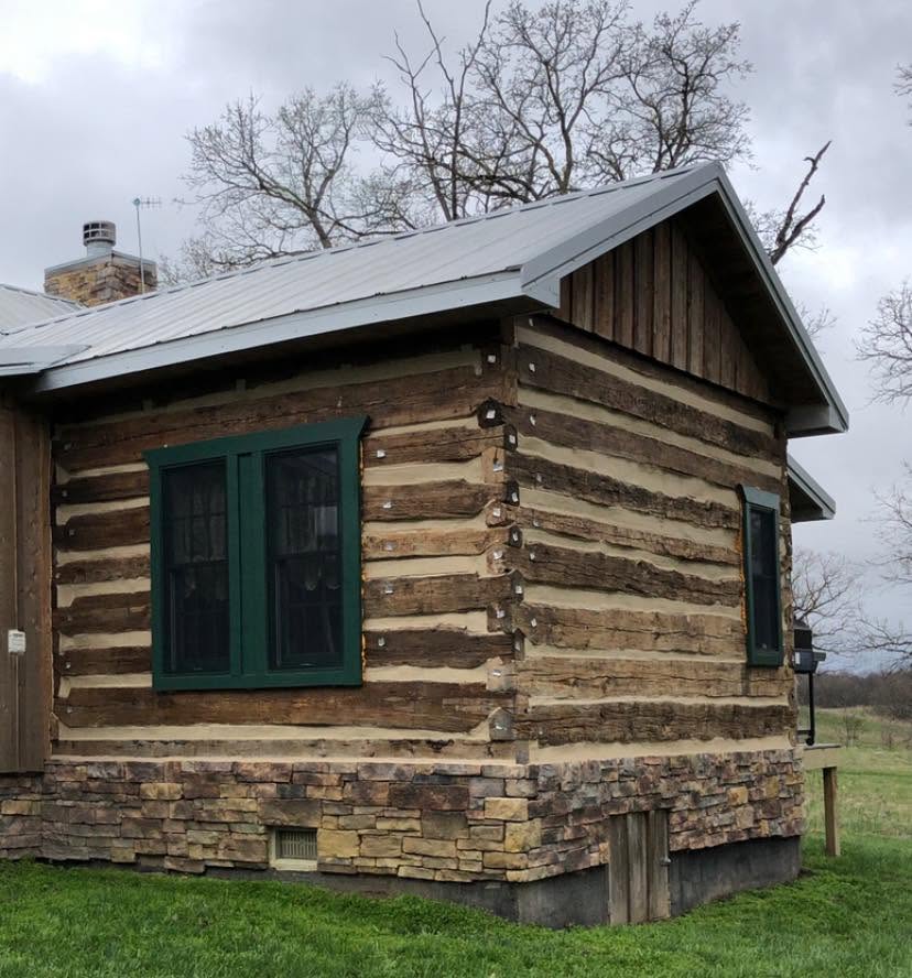 Fully restored historic log cabin with new chinking and preserved hewn logs