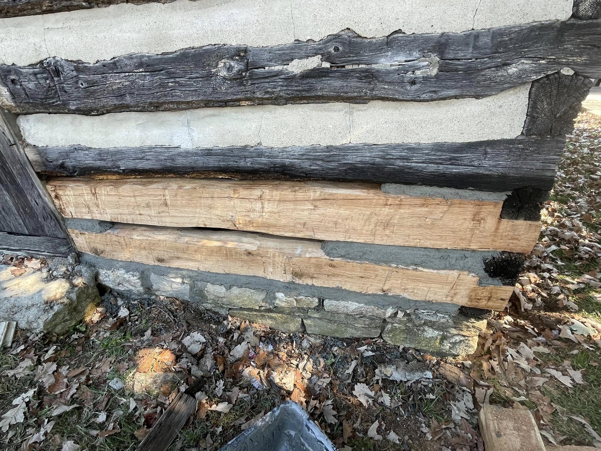 Restored log cabin with completed chinking