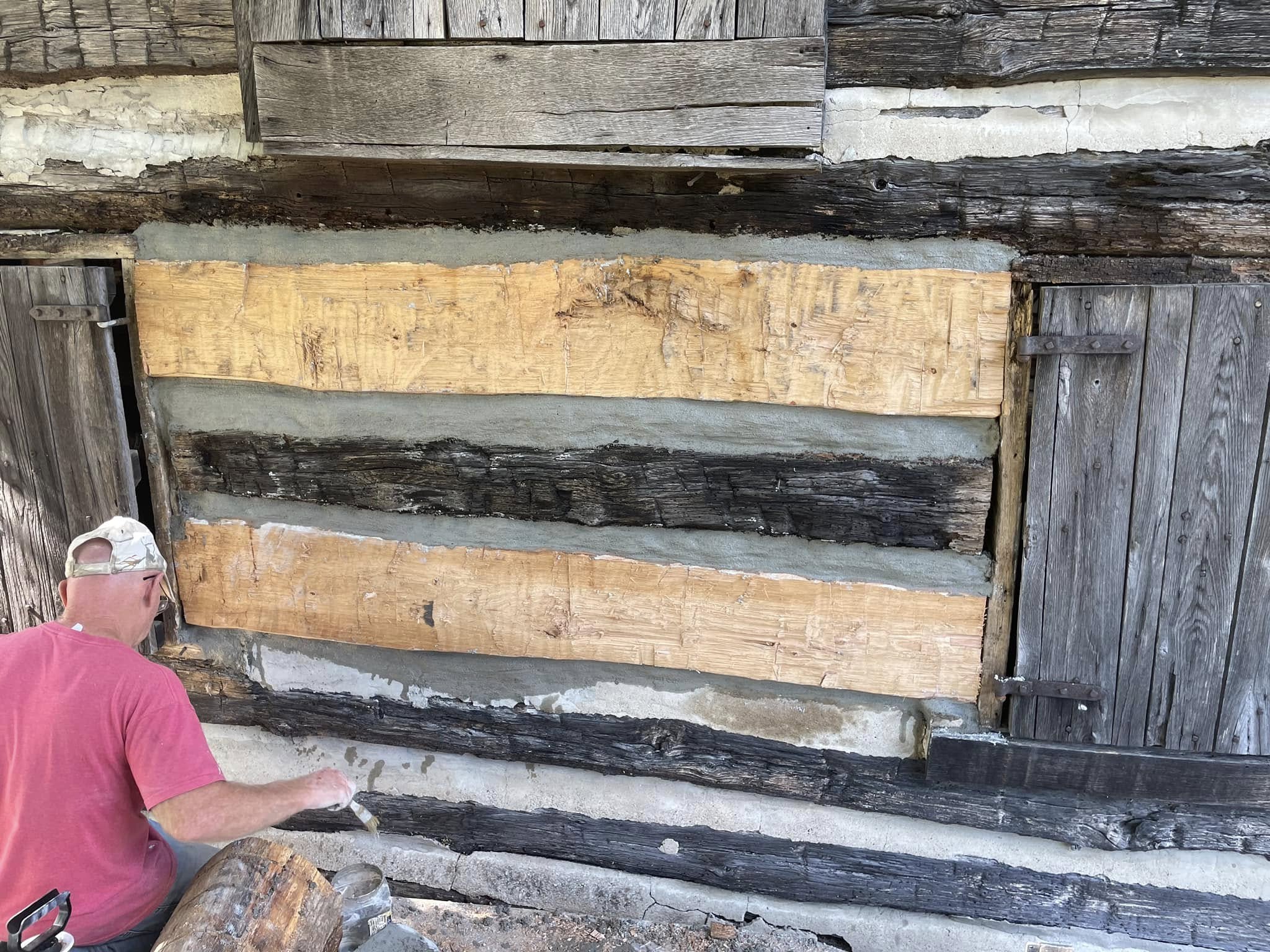 Detailed inspection of historic log door surround