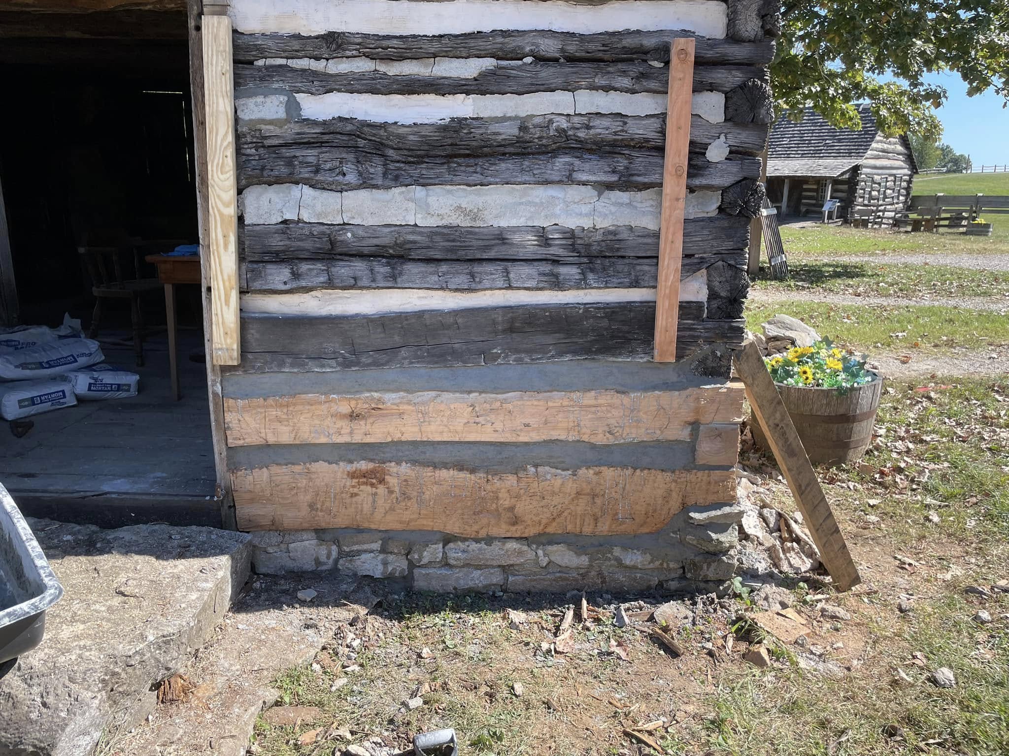 Condition assessment: failed foundation contact at historic log wall