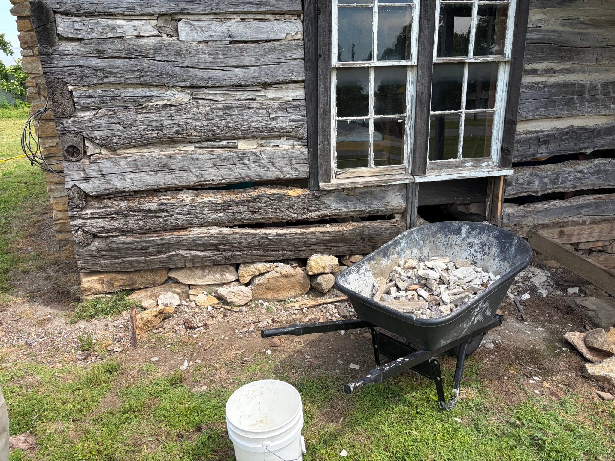 Long historic log building after restoration