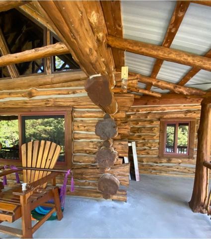Sticks & Stones hand-notched cedar log cabin work