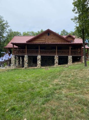 Sticks & Stones hand-notched cedar log cabin work