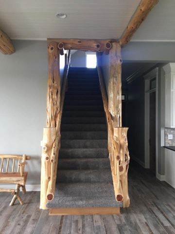 Sticks & Stones hand-notched cedar log cabin work
