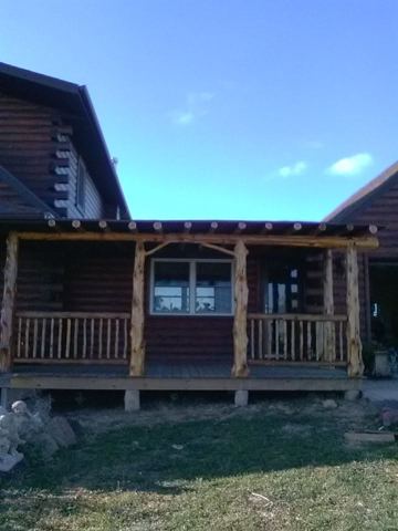 Sticks & Stones hand-notched cedar log cabin work