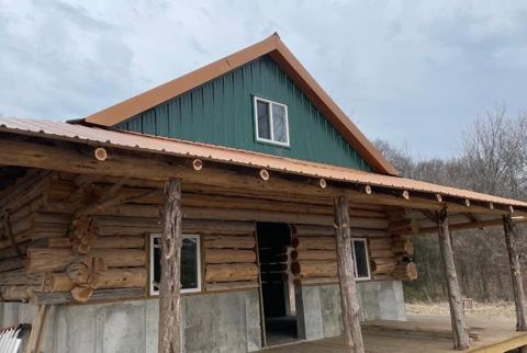 Sticks & Stones hand-notched cedar log cabin work