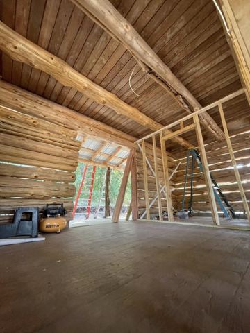 Sticks & Stones hand-notched cedar log cabin work