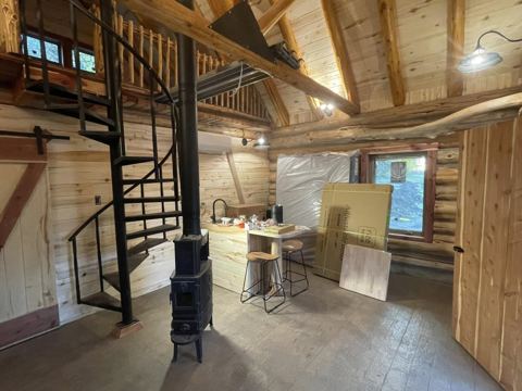 Sticks & Stones hand-notched cedar log cabin work