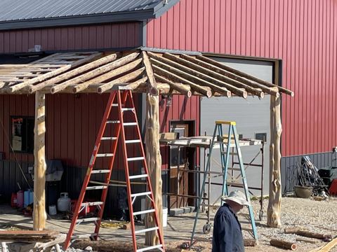 Sticks & Stones hand-notched cedar log cabin work
