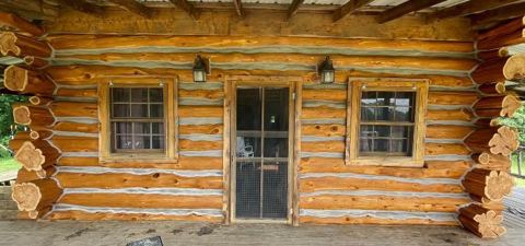 Sticks & Stones hand-notched cedar log cabin work
