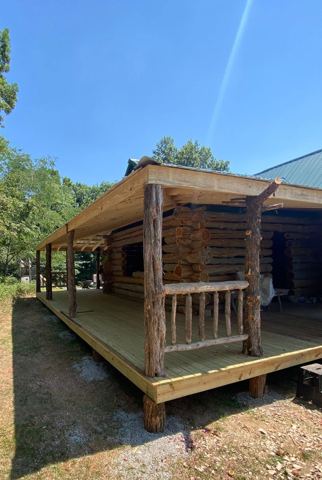 Sticks & Stones hand-notched cedar log cabin work
