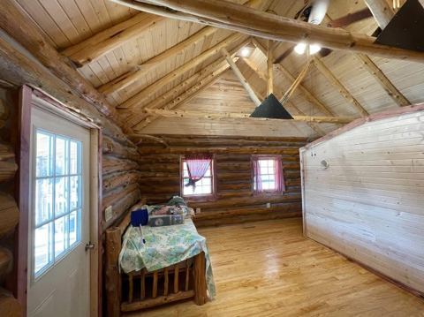 Sticks & Stones hand-notched cedar log cabin work