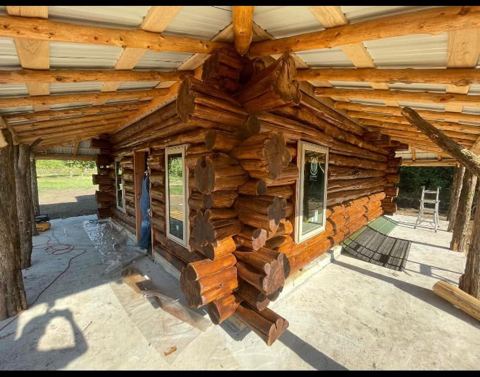 Sticks & Stones hand-notched cedar log cabin work