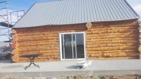 Sticks & Stones hand-notched cedar log cabin work