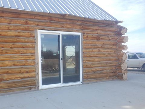 Sticks & Stones hand-notched cedar log cabin work