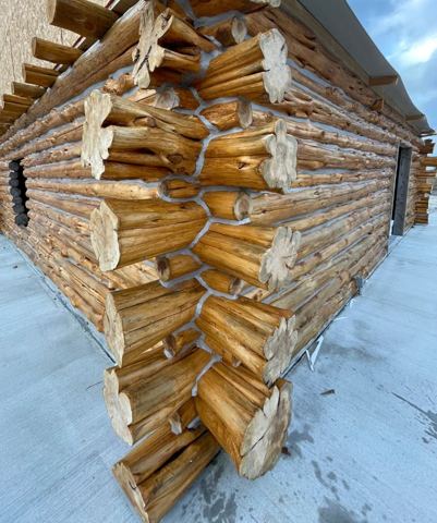 Sticks & Stones hand-notched cedar log cabin work