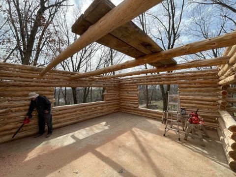 Sticks & Stones hand-notched cedar log cabin work
