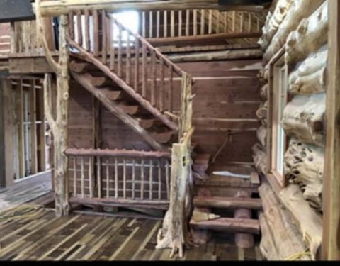Sticks & Stones hand-notched cedar log cabin work