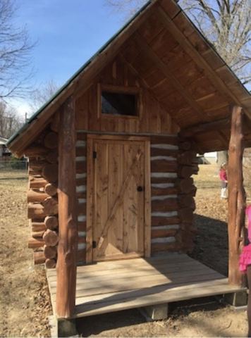 Sticks & Stones hand-notched cedar log cabin work