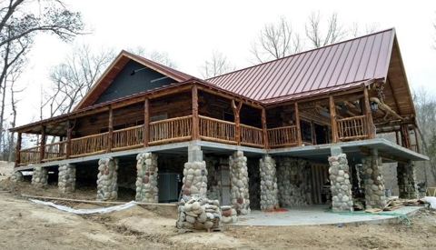 Sticks & Stones hand-notched cedar log cabin work