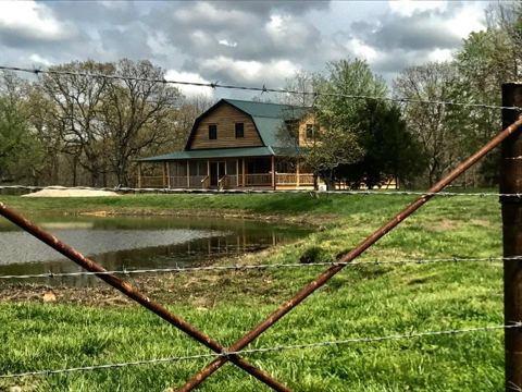 Sticks & Stones hand-notched cedar log cabin work