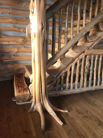 Sticks & Stones hand-notched cedar log cabin work