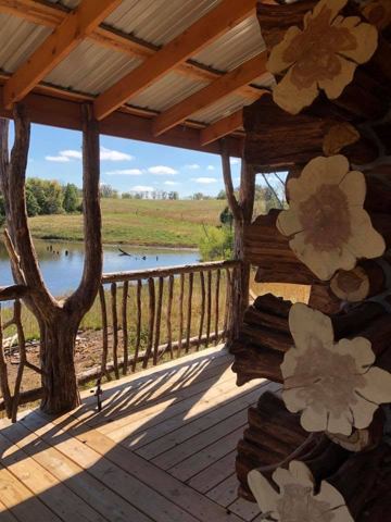 Sticks & Stones hand-notched cedar log cabin work