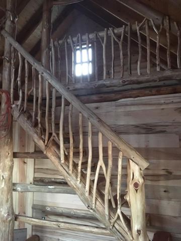 Sticks & Stones hand-notched cedar log cabin work