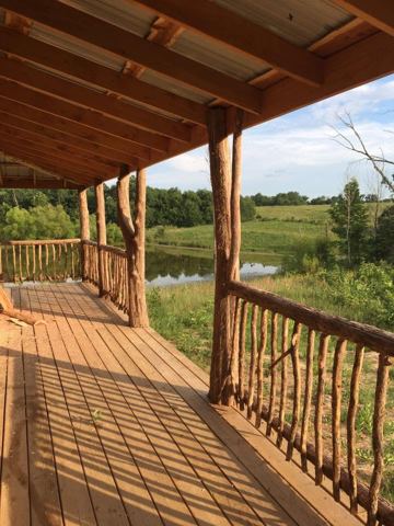 Sticks & Stones hand-notched cedar log cabin work