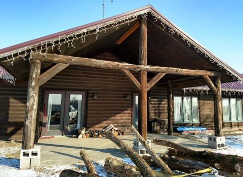 Sticks & Stones hand-notched cedar log cabin work