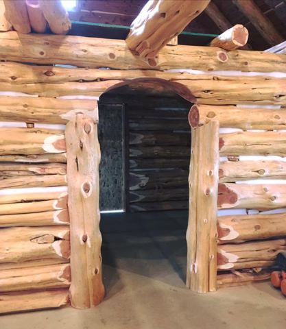 Sticks & Stones hand-notched cedar log cabin work