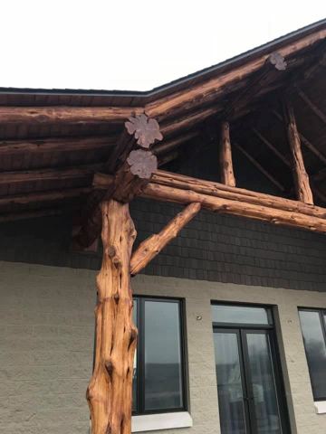 Sticks & Stones hand-notched cedar log cabin work