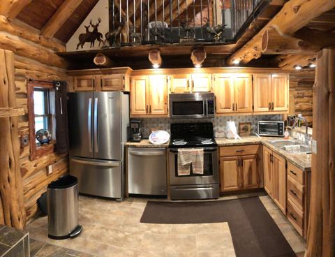 Sticks & Stones hand-notched cedar log cabin work