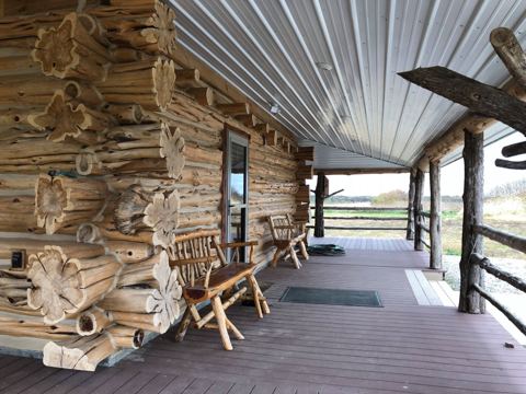 Sticks & Stones hand-notched cedar log cabin work