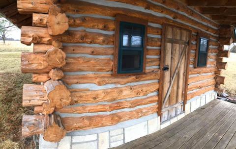 Sticks & Stones hand-notched cedar log cabin work